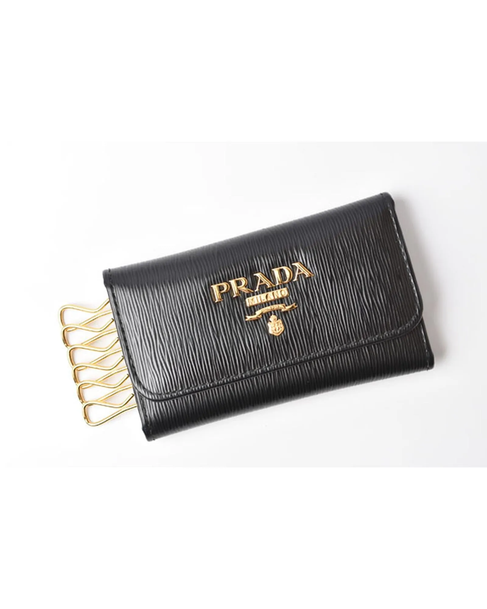 Embossed Leather Key Holder in Black by a Luxury Designer