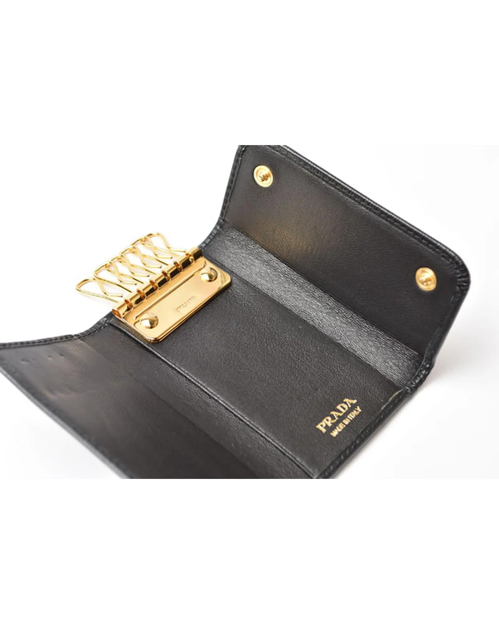 Embossed Leather Key Holder in Black by a Luxury Designer