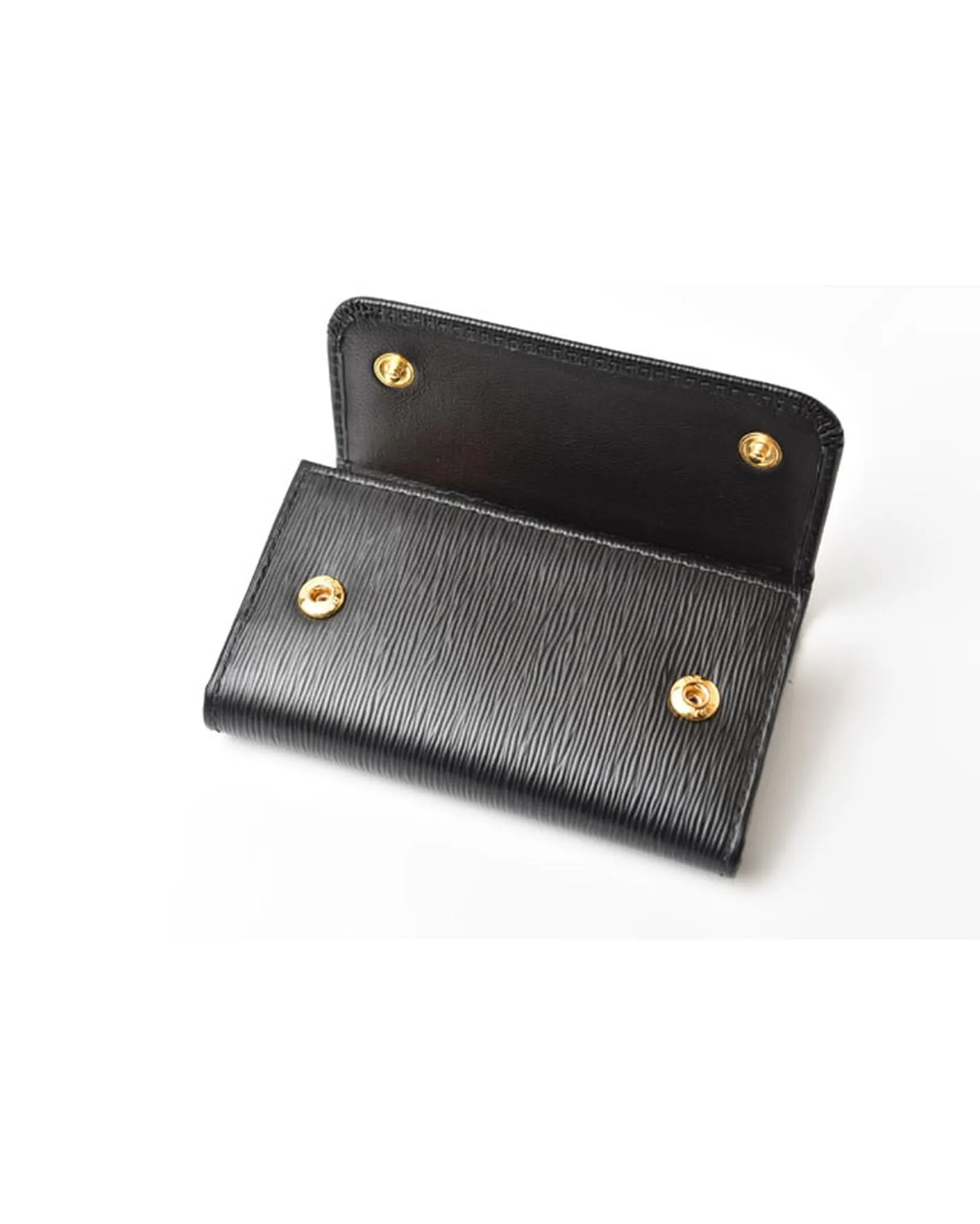 Embossed Leather Key Holder in Black by a Luxury Designer